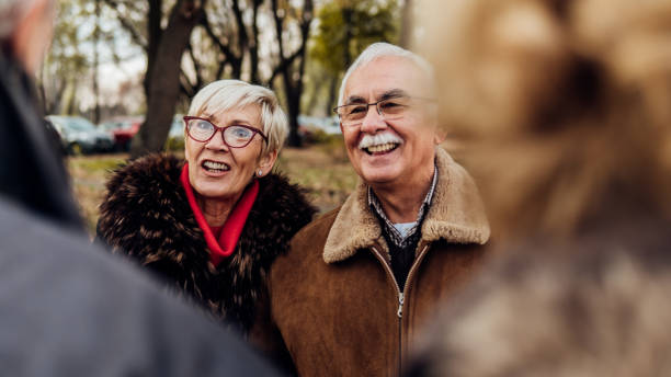 istock Happy couple with friends 1074286516