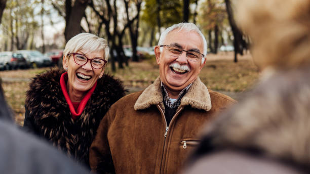 istock Smiling couple in the park 1074286718