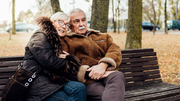 istock Couple resting in the park 1074288960