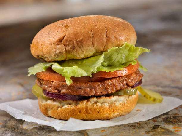 The Meatless Burger - 100% Plant Based Protein Burger The Meatless Burger - 100% Plant Based Protein Burger veggie burger photos stock pictures, royalty-free photos & images