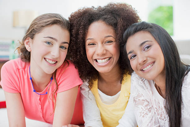 smiling teenage girls - interior teens bildbanksfoton och bilder