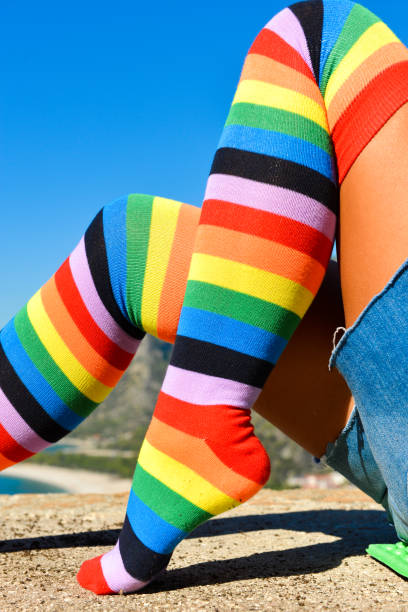 istock Colored socks. Woman with legs raised. 1074289966