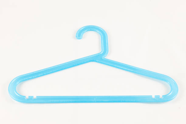 istock clothes plastic hangers isolated on white background 1074293418