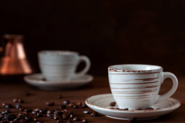 istock Coffee cups and copper Turk on the table 1074293516