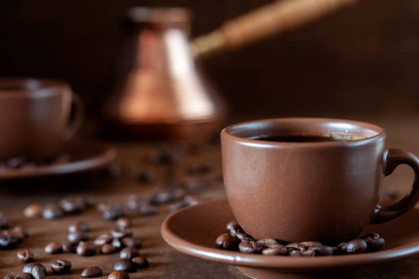 istock Coffee cups and copper Turk on the table 1074294550