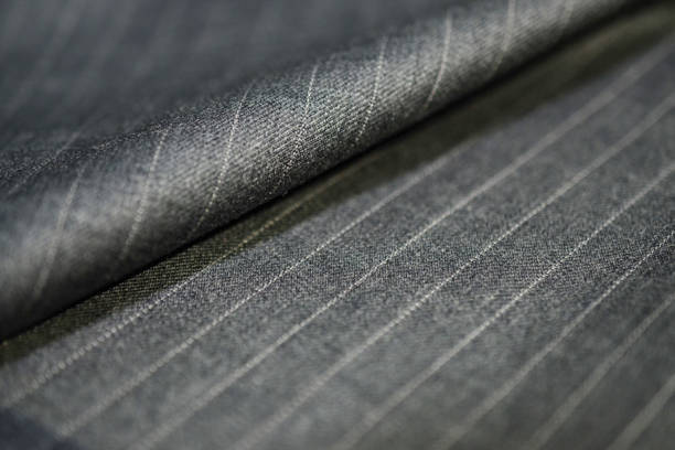 istock close up role texture silver fabric of suit 1074298868