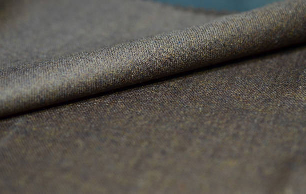 istock close up texture brown fabric of suit 1074298882