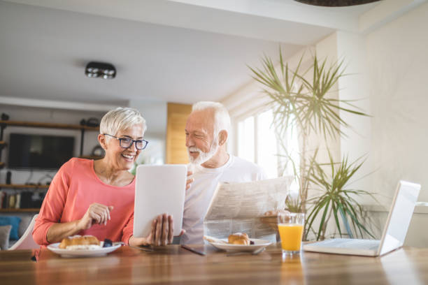 istock Vital senior couple enjoying their time during breakfast 1074299430