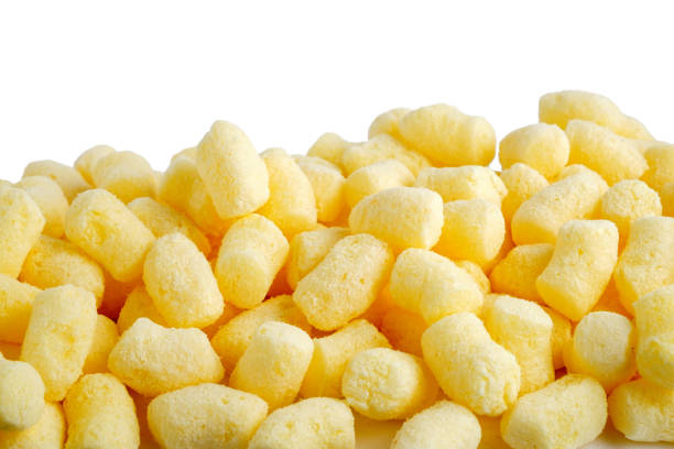 istock Scattered sweet corn sticks isolated on white 1074300064