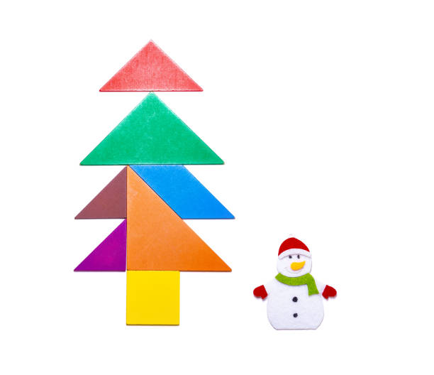 istock tangram blocks shape as Christmas tree with snowman on white 1074329014