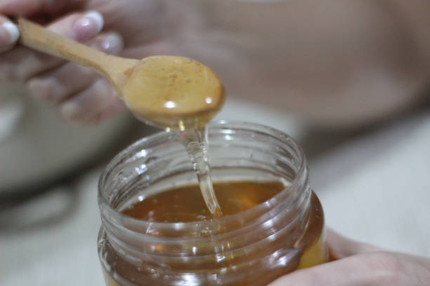 istock honey in the jar 1074333388