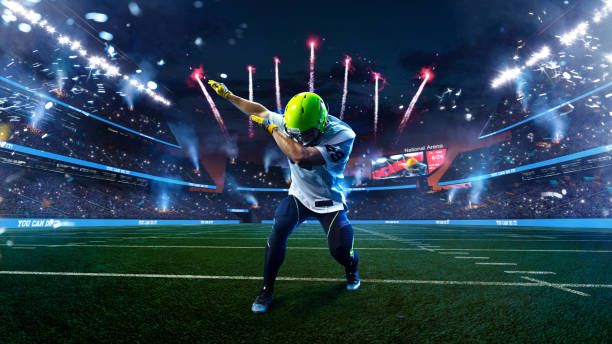 american football player celebrate tocuhdown on stadium. sport wallpaper or advertising - football player american football sport determination imagens e fotografias de stock