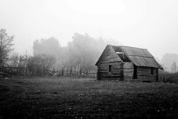 House in the fog, Antalya / Turkey. Black and white photo, added noise.