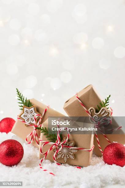 Christmas Background With Gift Boxes Wrapped In Brown Kraft Paper Flat Lay  Stock Photo - Download Image Now - iStock