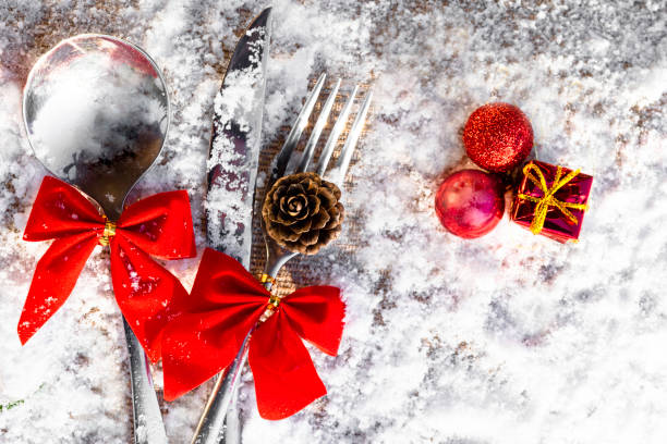 istock Christmas table setting with cones, decorative gift, balls, bows copy space 1074392216