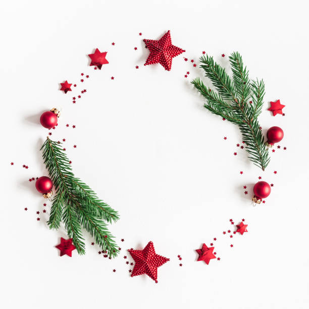 istock Christmas composition. Fir tree branches, red and green decorations on white background. Christmas, winter, new year concept. Flat lay, top view, copy space, square 1074394346