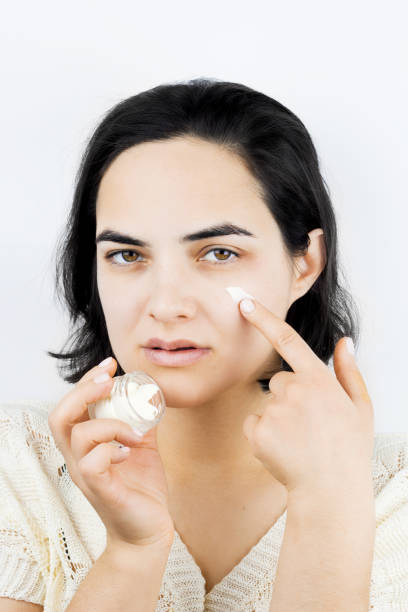 istock woman with cream 1074412762