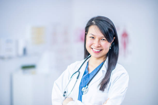 istock Smiling female doctor 1074433490