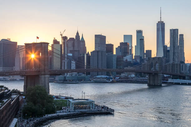 istock Sunset through the Brooklyn Bridge in NYC 1074436062