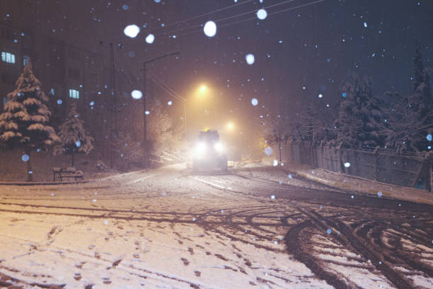 istock snow in the night city 1074436896