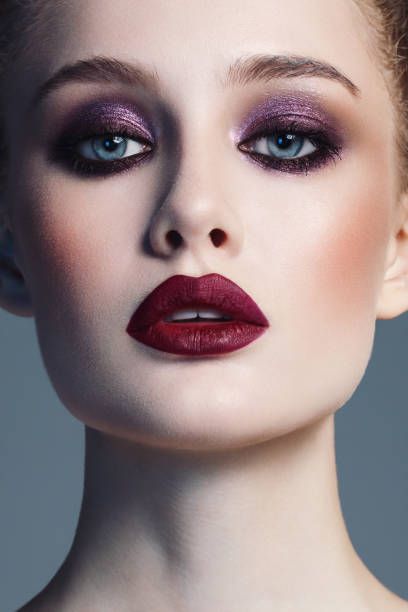 istock Beautiful woman with bright make-up 1074452308