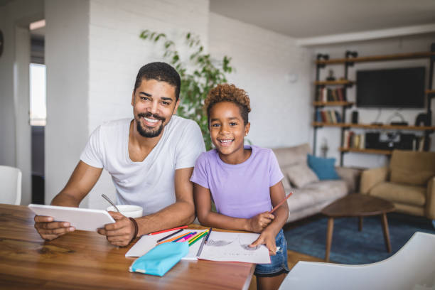 istock Lovely mixed race family at home 1074453552