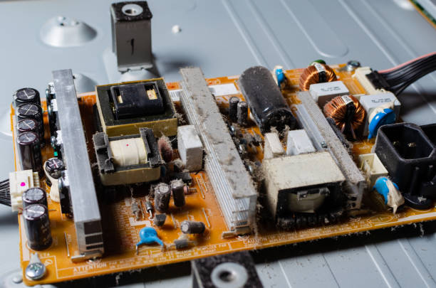 istock A thick layer of dust covers the internal electronic components of the computer 1074457802