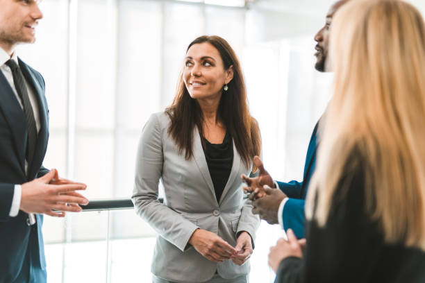 istock Multi ethnic group of businesspeople talking in the office 1074462964