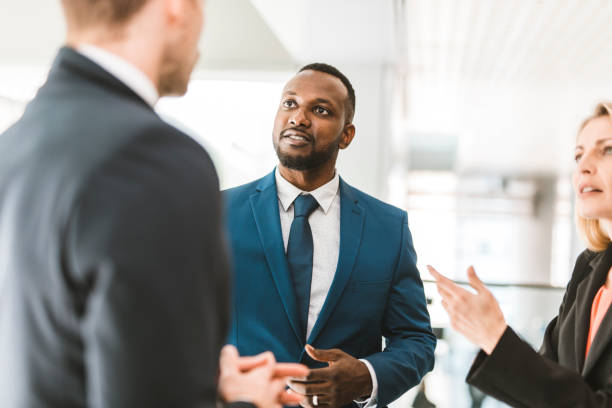 istock Small group of businesspeople talking 1074462984
