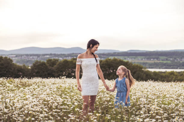 istock Mother spending time with daughter during the sunset. 1074464722