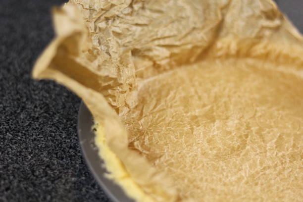 istock Pastry case in tin lining with crumpled parchment for baking beans 1074473602