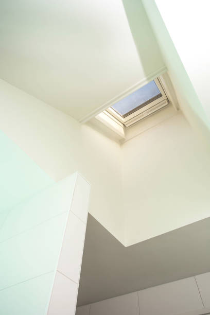 istock Plastic mansard or skylight window on attic with environmentally friendly and energy efficient thermal insulation rockwool. 1074473688