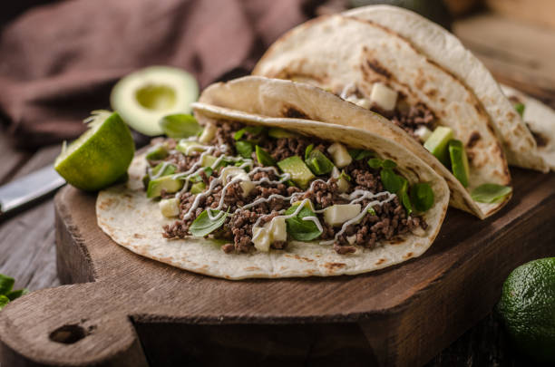 istock Homemade minced beef tortilla, fresh avocado and mozarella cheese 1074483384