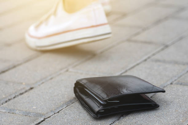 istock Lost leather wallet on the ground 1074500622