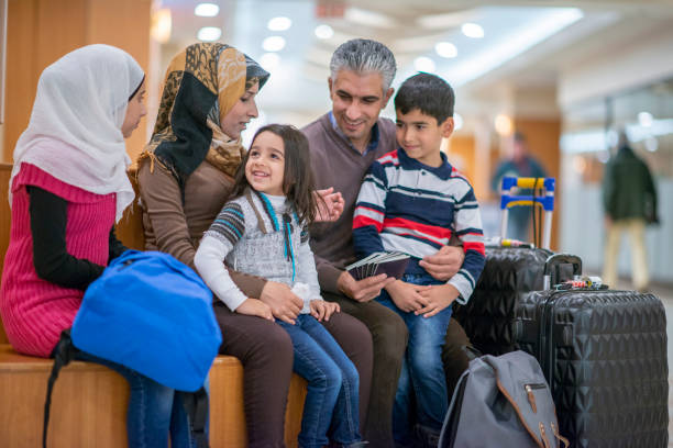 istock Muslim family sitting down 1074511920