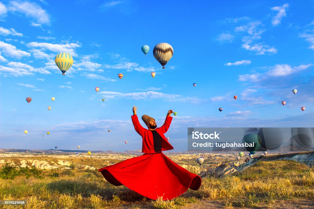 Whirling Dervish in Cappadocia Whirling dervish, Ishak Urun in Cappadocia, Turkey Türkiye - Country Stock Photo