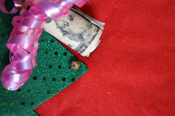 dinheiro de natal - twenty dollar bill currency gift money roll - fotografias e filmes do acervo