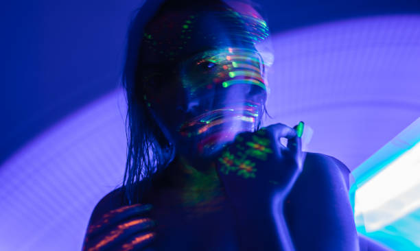 istock Woman with fluorescent makeup 1074524584