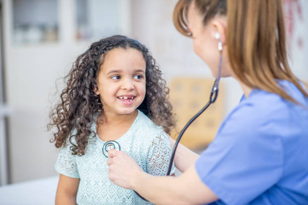 istock Little girl having her heart checked 1074533402