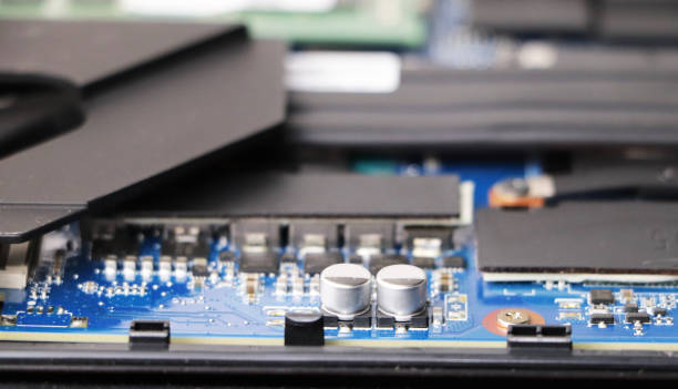 istock Closeup of laptop microcircuits. 1074533788