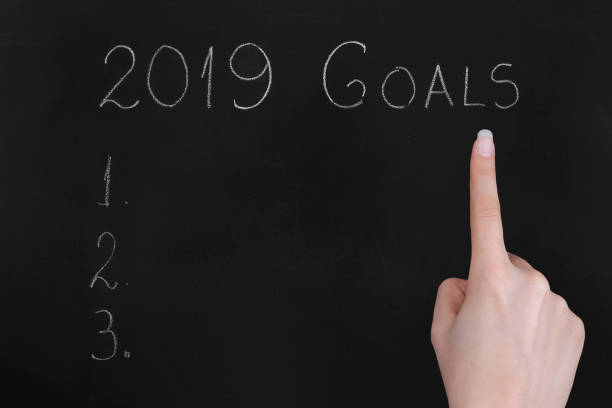 istock Empty numbered blackboard list for business goals for 2019 1074533796