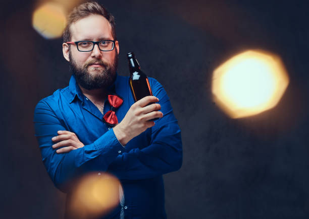 istock A man drinks craft beer from a bottle. 1074538072