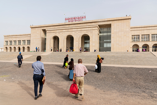 People heading for the train station Gare de Nagad - Djibouti early in the morning. The train leaving from this station connects Djibouti and Port Doraleh with the capital of Ethiopia Addis Abebia. Nagad Railway Station is the new and only passenger rail station of Djibouti City.