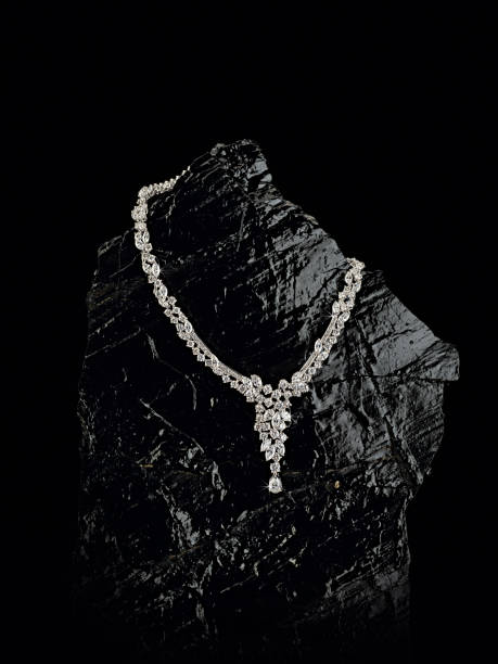 istock Diamond engagement Necklace on black background. 1074547600