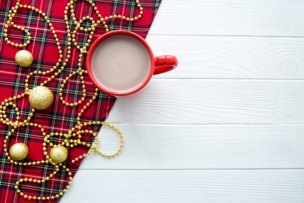 istock A cup of hot cacao on white wooden table. Space for text. 1074550816
