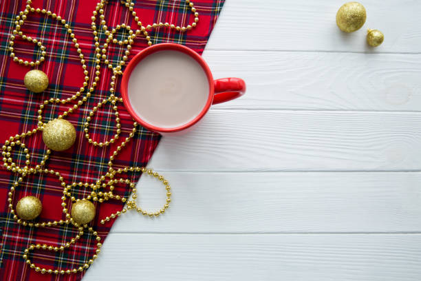 istock A cup of hot cacao on white wooden table. Space for text. 1074550826