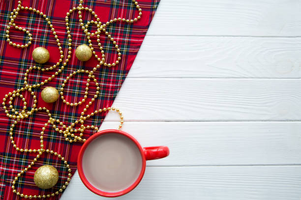 istock A cup of hot cacao on white wooden table. Space for text. 1074550856