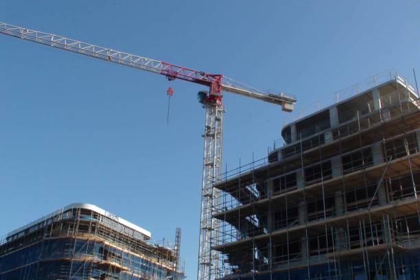 istock New Building Under Construction And Summer Blue Sky View 1074576784