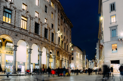 Long exposure of xmas shoppers at Corso Vittorio Emanuele ii near Duomo in Milan, Lombardy, Italy on a cold November night