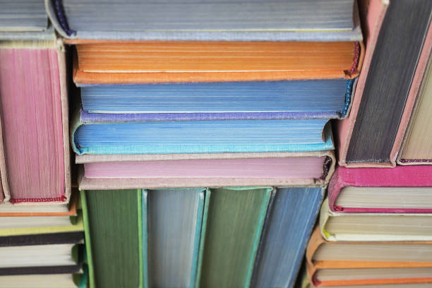 istock Many old books stacked in texture 1074589630